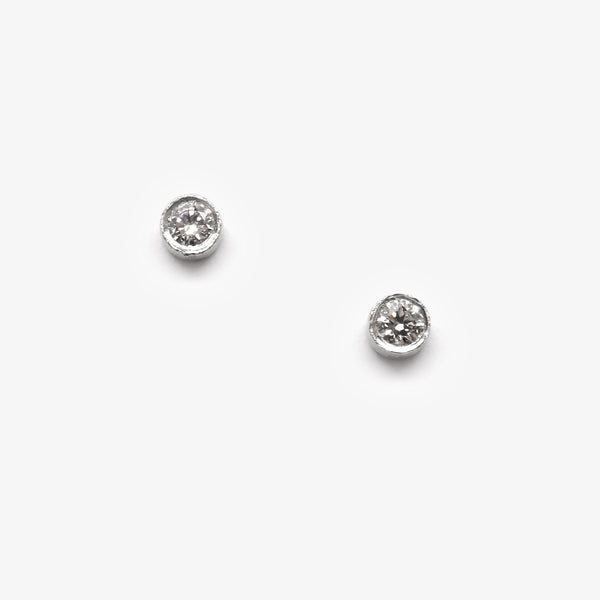 PLATINUM CYLINDER STUDS + 0.05CT DIAMONDS